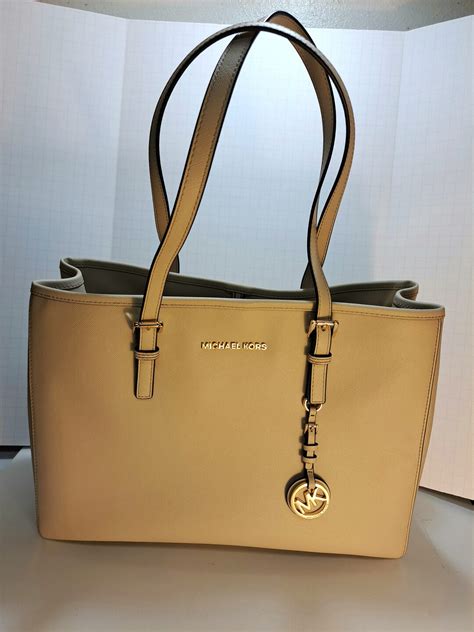 sac michael kors blanc cassé|michael kors white purses.